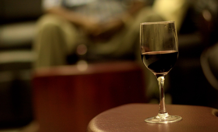 A wine glass photographed against a background